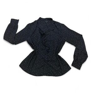 Black and white star print blouse with ruffle detailing whimsy goth fairy core